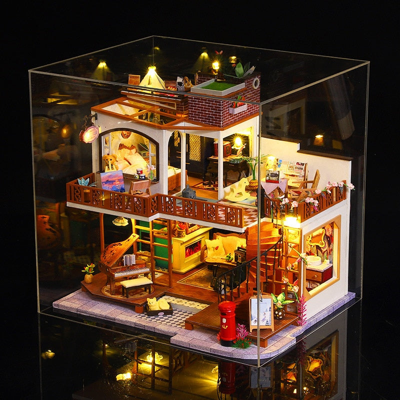 a model of a house is shown in a glass case