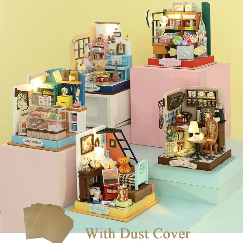 a group of miniature doll houses sitting on top of each other