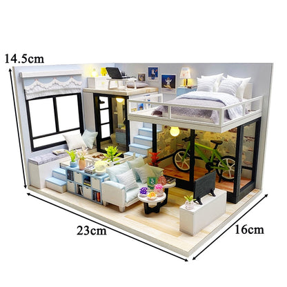 a model of a house with furniture and a bedroom