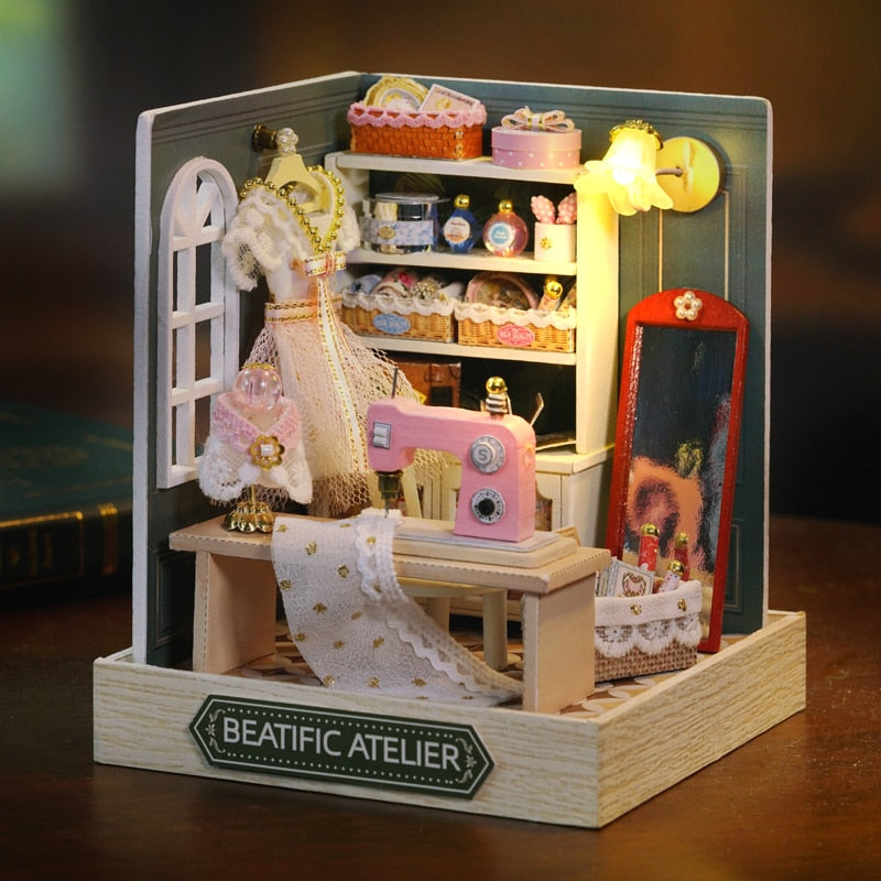 a miniature doll house with a doll in it